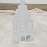 Kovový svícen domeček