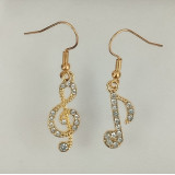 Hudební náušnice zlatý